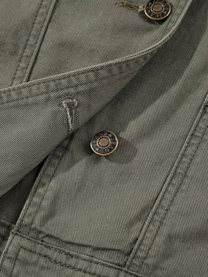 Ruffled denim vest in olive green with button closure and branded buttons.