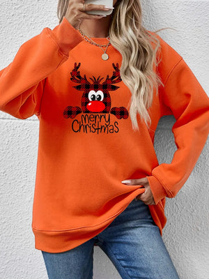 Orange crewneck sweatshirt with plaid reindeer graphic and Merry Christmas text.