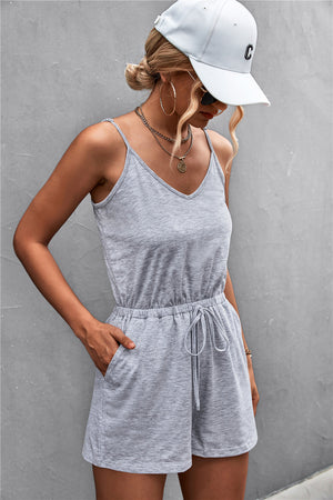 Slinky V-neck drawstring romper in Gray Dawn with adjustable waist and pockets.