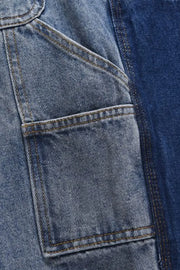 Panelled denim carpenter shorts in dark and medium blue washes with contrast stitching.
