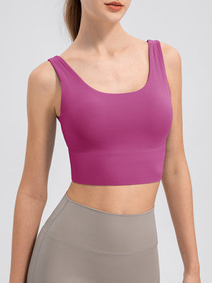 Sculpted backless crop top in Red-Violet with scoop neck and wide band.