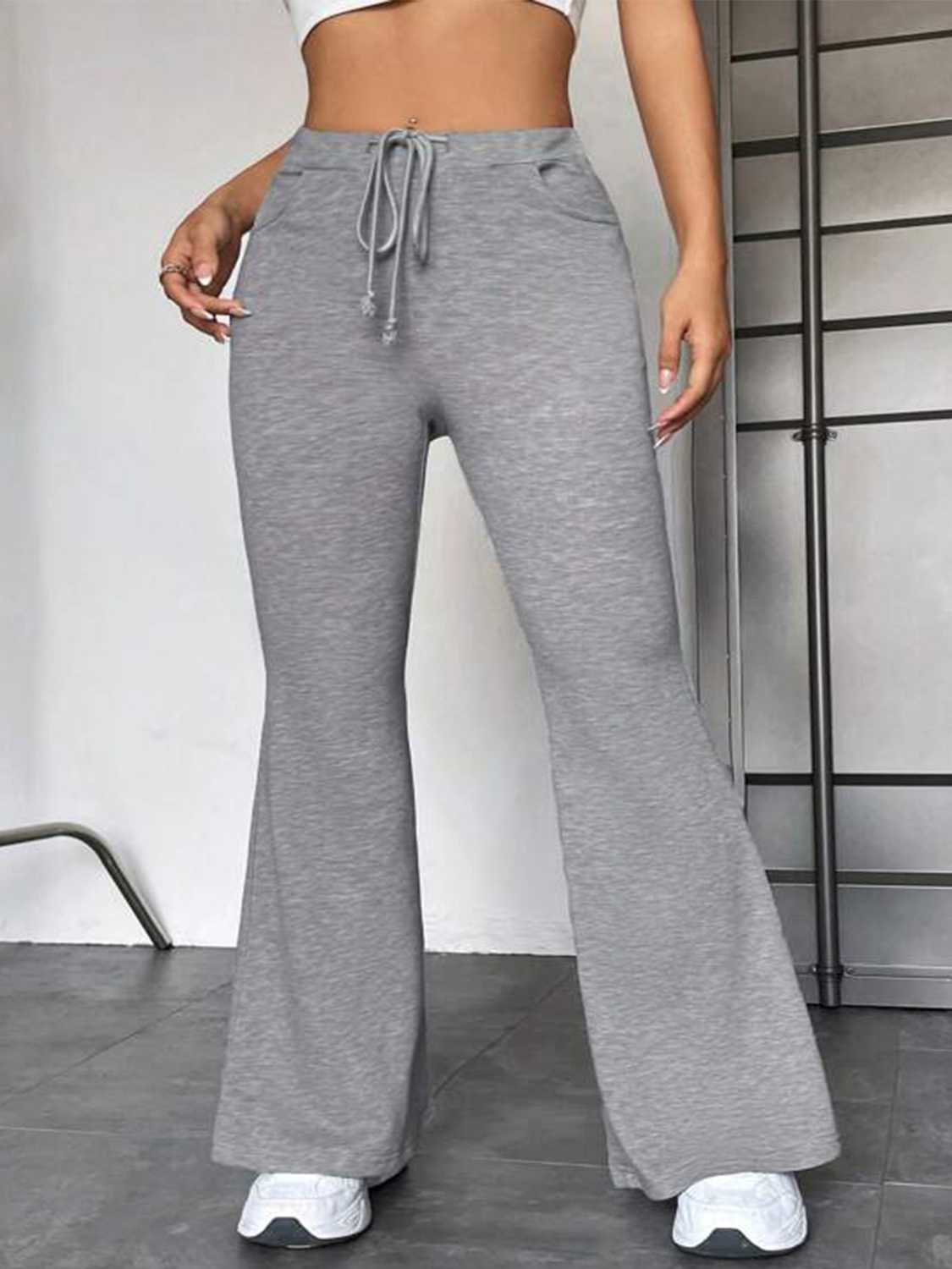 Flare leg lounge trousers in heather gray with drawstring waist and pockets.
