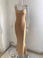 Camel spaghetti strap bodycon maxi dress with a fishtail hem.