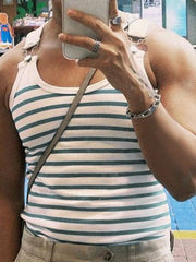 Harness-detail breton stripe tank top in Air Force Blue with white stripes.