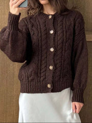 Brown cable-knit button-down cardigan with balloon sleeves and round neckline.
