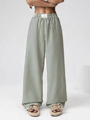 Navy and white striped high-waisted wide-leg pants with a drawstring waist.