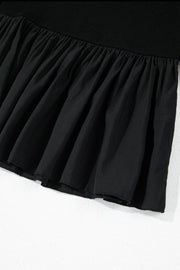 Black ribbed bodice peplum top with ruffled hem detail