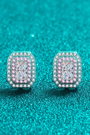 Silver halo stud earrings with emerald-cut center stone and pink accent stones.