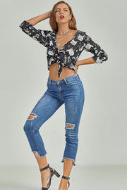 Black celestial cat print blouse with tie front and V-neck, long sleeves.