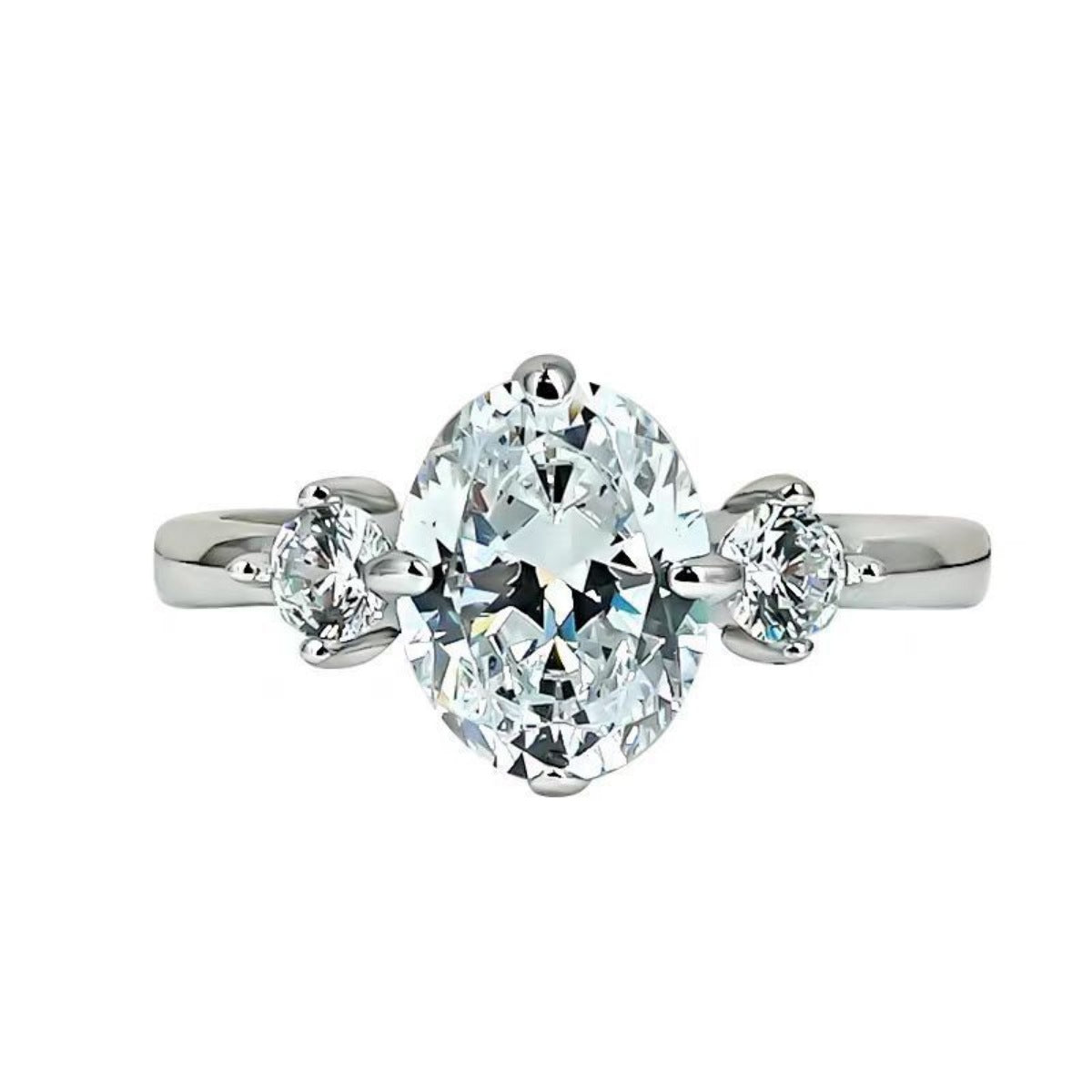 Moissanite sterling silver ring with oval center stone and accent stones.