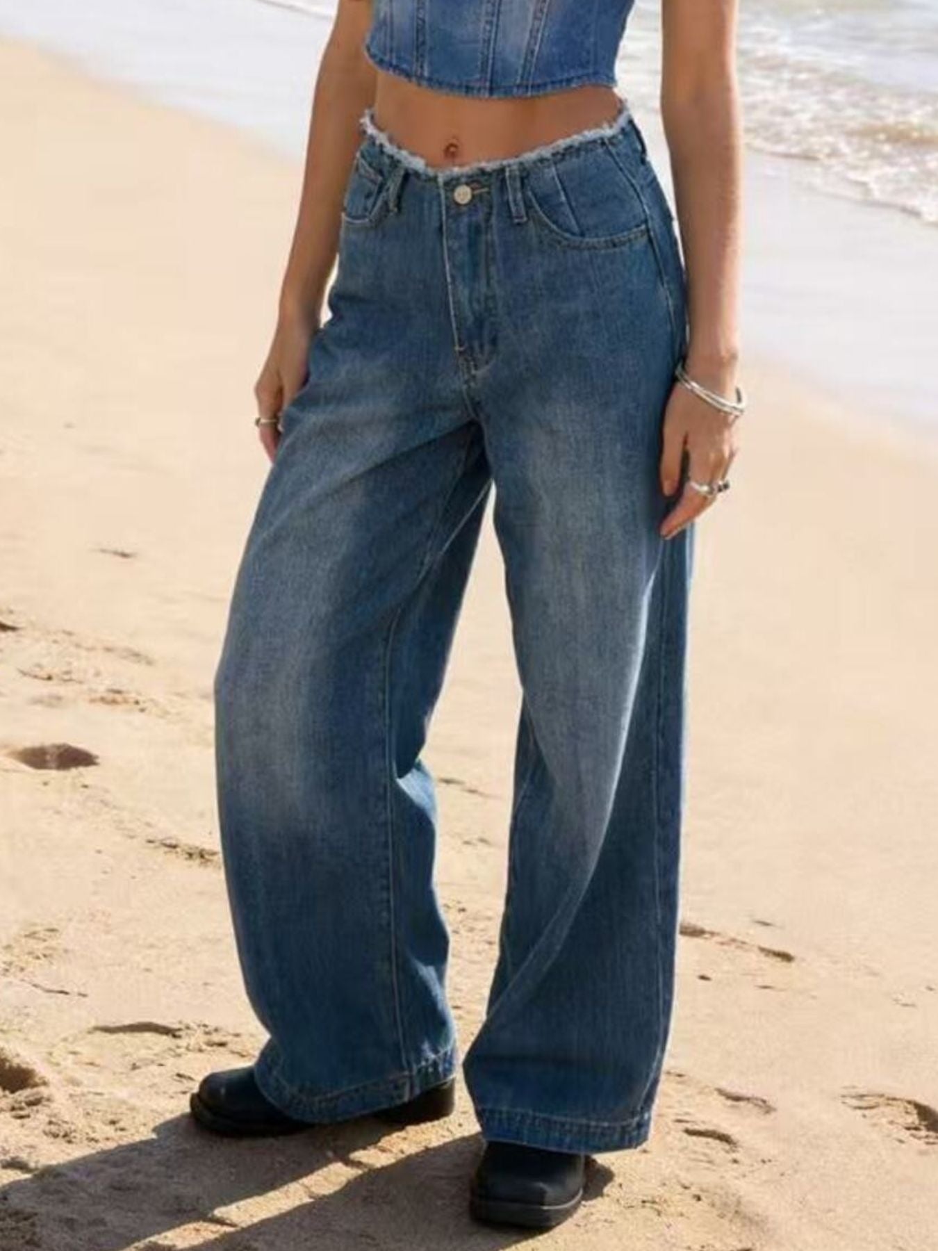 Blue cotton maternity jeans with frayed hem and wide leg