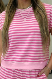 Pink and white striped cotton two-piece set with crew neck top and shorts.