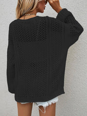 Black open-knit acrylic cardigan with balloon sleeves and a relaxed fit.