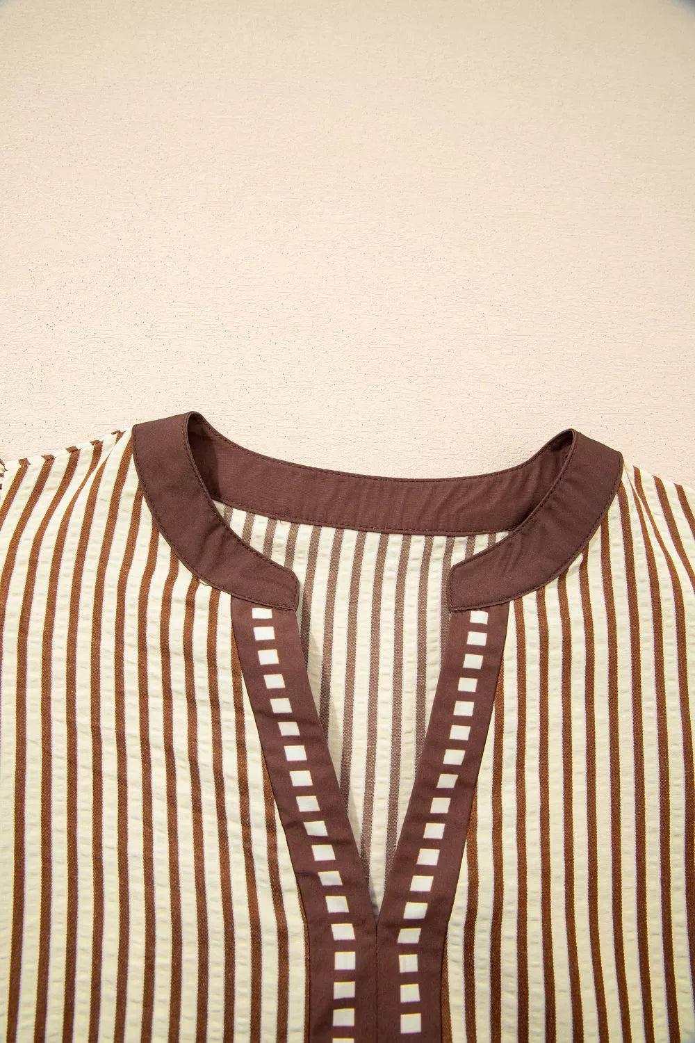 Striped plus size midi dress with brown trim and square detail at V-neck.