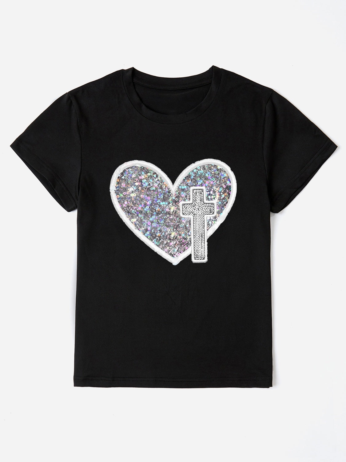 Black t-shirt with iridescent heart and cross appliqué detail.