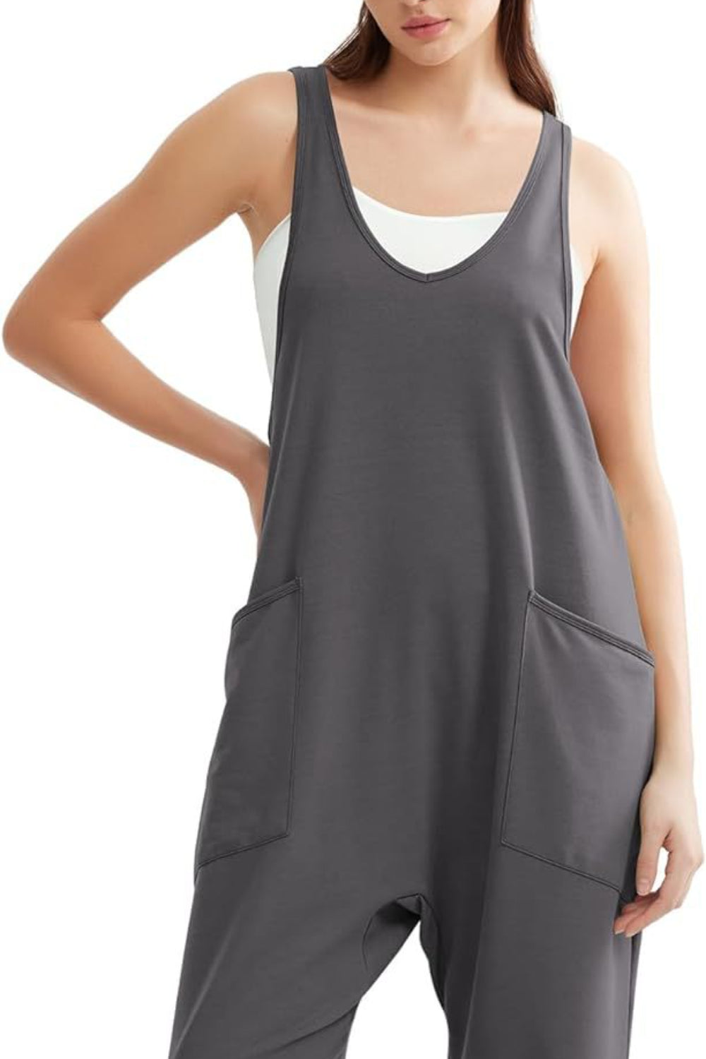 Relaxed fit dark gray jumpsuit with V-neck, sleeveless, and large front pockets.