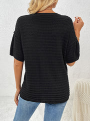 Black textured knit t-shirt with boxy silhouette and short sleeves