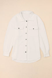 Textured ivory overshirt with patch pockets and button front.