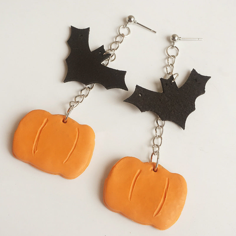 Halloween charm drop earrings with black bats and orange pumpkins.