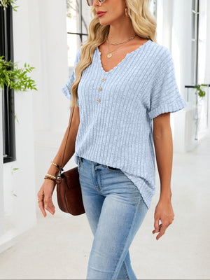 Light blue ribbed knit short sleeve t-shirt with V-neck and decorative buttons.