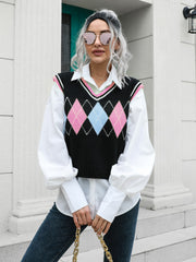 Argyle knit sweater vest with pink and blue diamonds, V-neck, trimmed with pink and white.