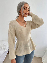 Peplum knit sweater with scallop neckline in caramel, long sleeves, and a fitted waist.
