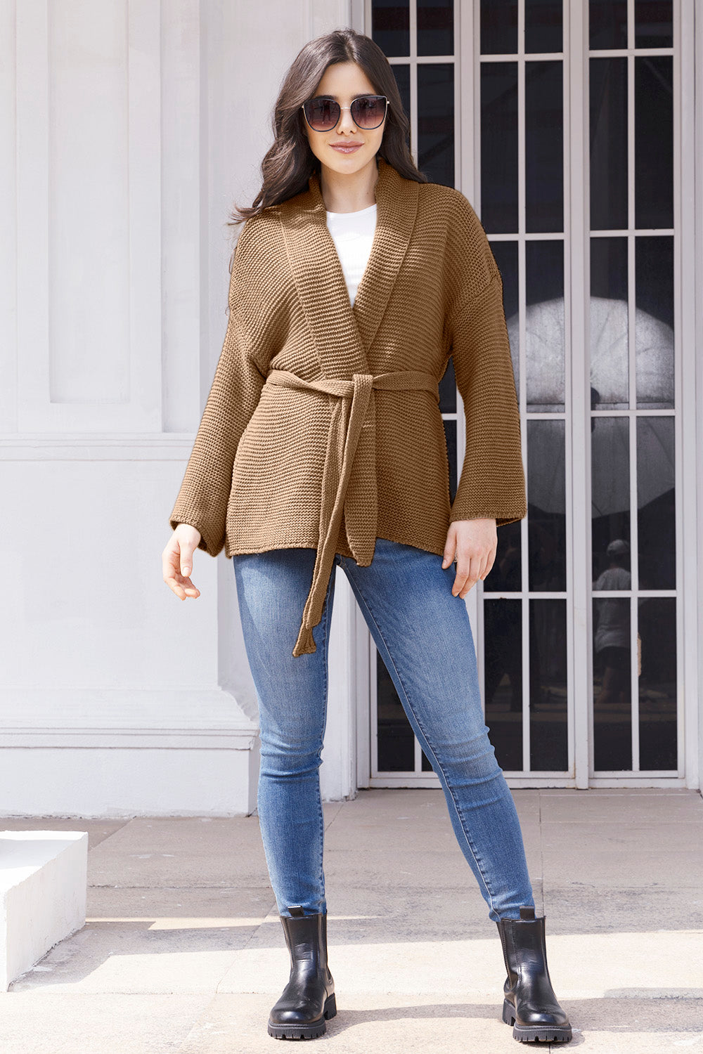 Belted waffle knit cardigan in camel with a shawl collar and tie waist.