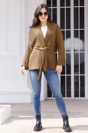 Belted waffle knit cardigan in camel with a shawl collar and tie waist.