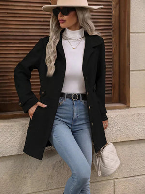 Black button-up trench coat with cinched waist, gold buttons, and notched lapels.