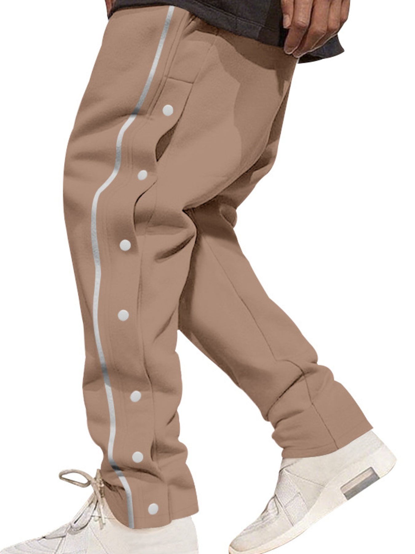 Khaki men's track pants with side snap buttons and reflective stripe detail.
