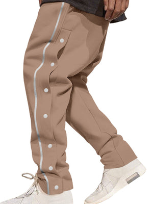 Khaki men's track pants with side snap buttons and reflective stripe detail.