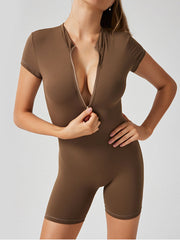 Brown short sleeve zip-front bodysuit with a high neckline and short legs.