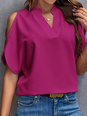 Open-shoulder blouse in Watermelon pink polyester with V-neck and cut-out sleeves.