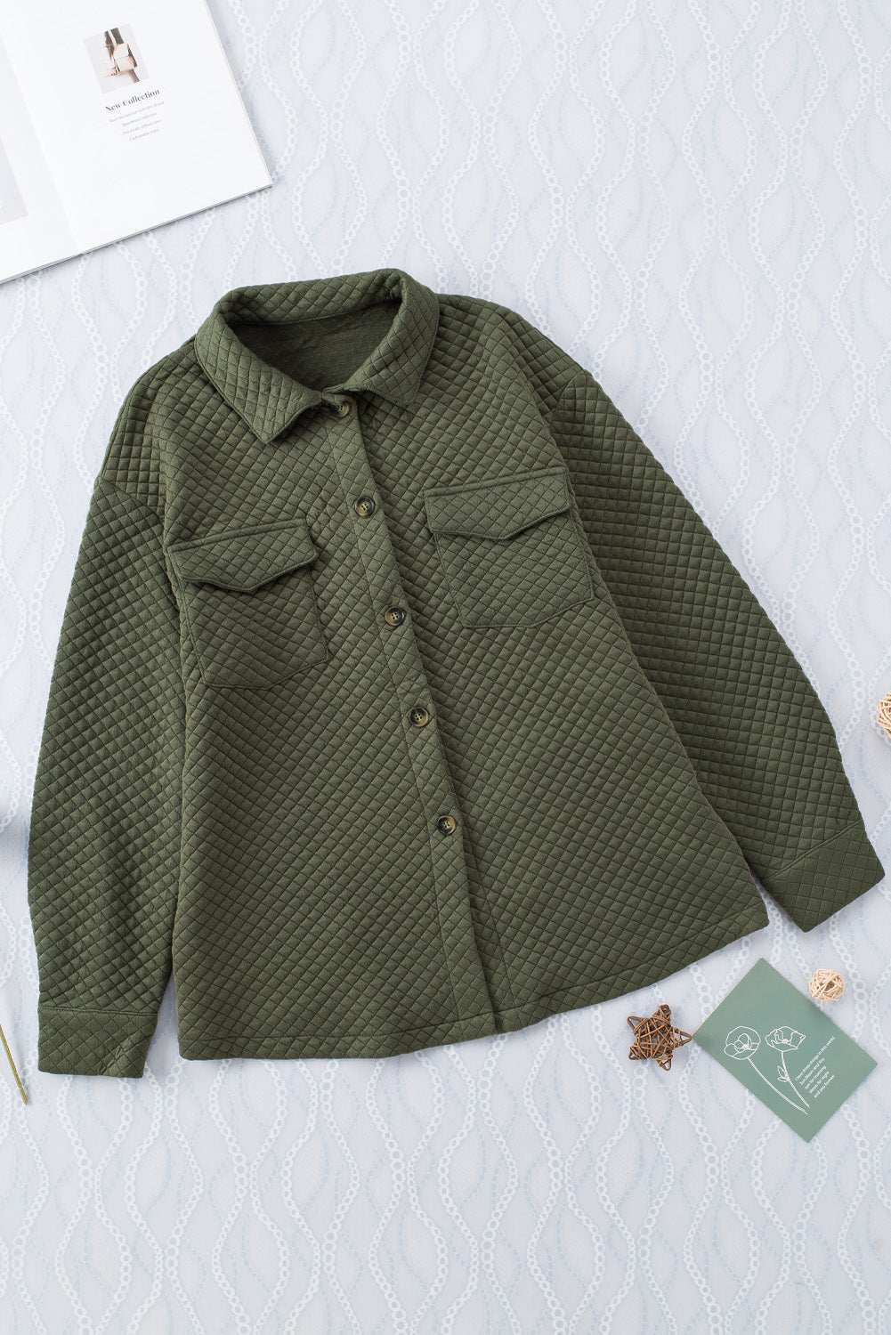 Army green quilted overshirt with patch pockets and button front.