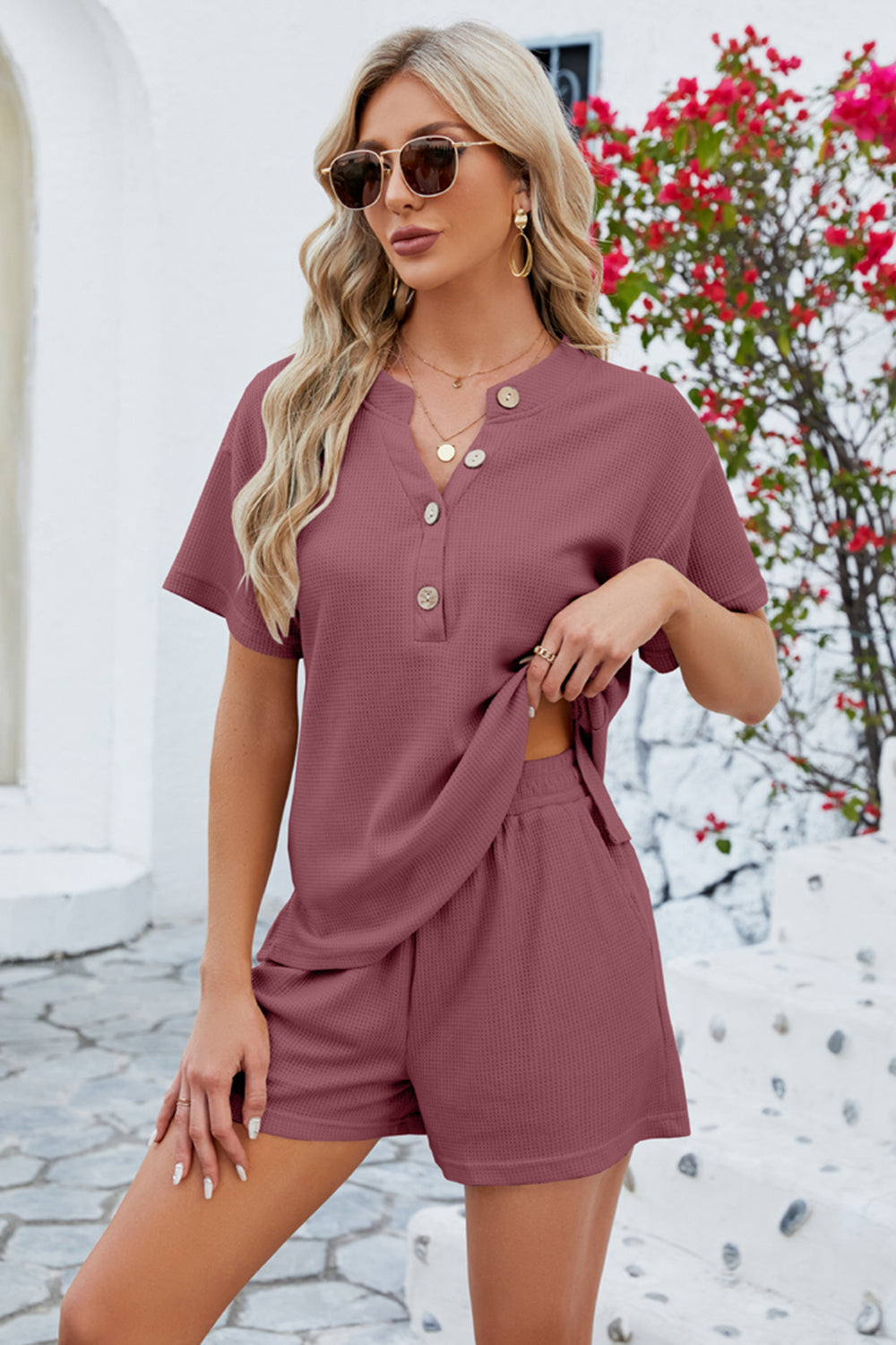 Waffle knit henley short set in rust with button detail and elastic waist shorts.