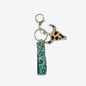 Turquoise embossed leather keychain with leopard print crystal bull charm