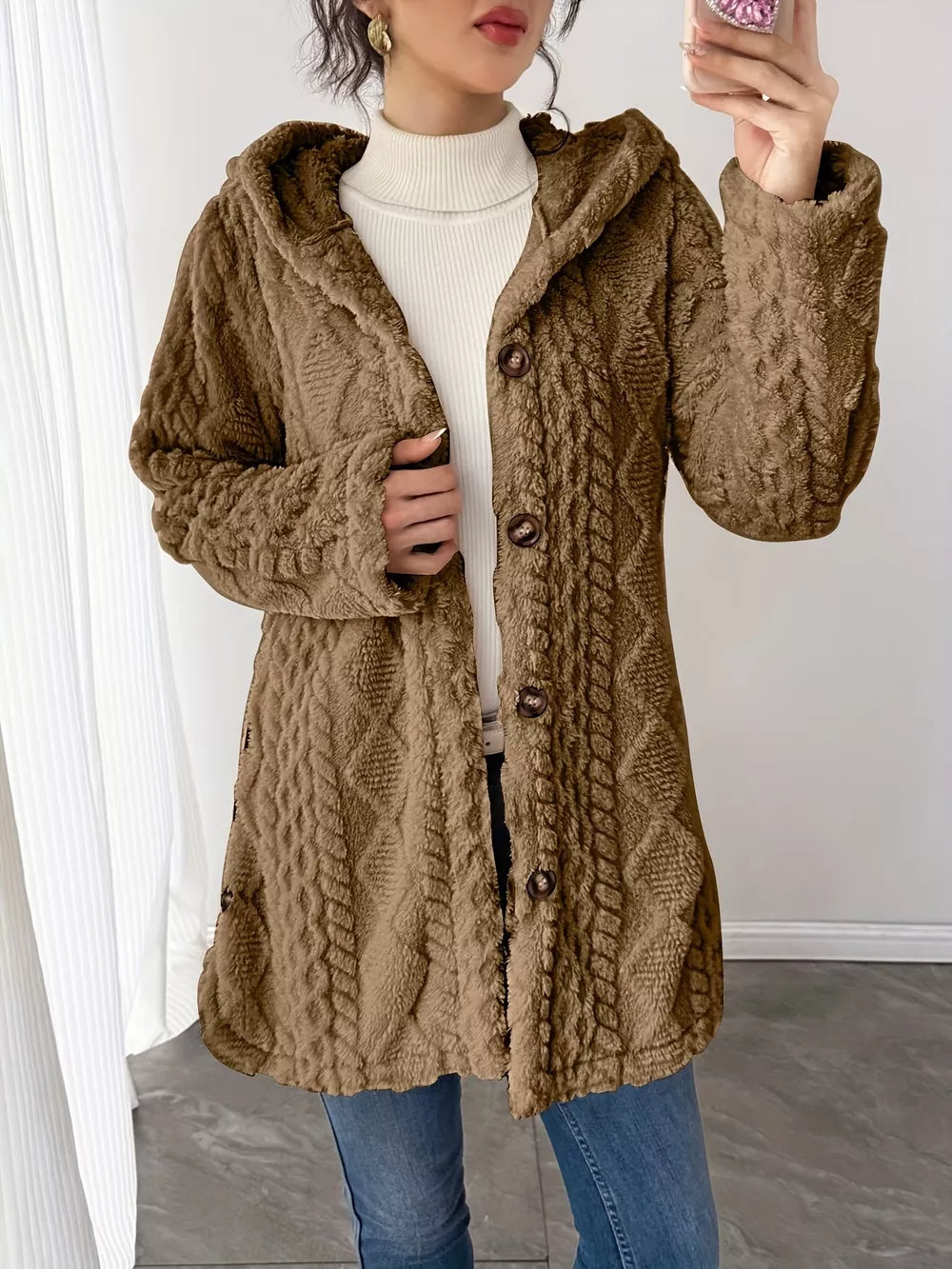 Camel hooded teddy trench coat with cable knit texture and button detail.