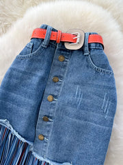 Patchwork denim midi skirt with button front, frayed hem, and striped fringe detail.