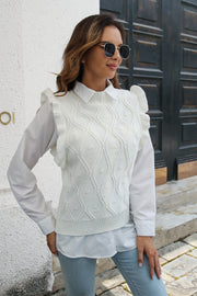 White diamond knit ruffle vest top with crew neck, styled over a white collared shirt.