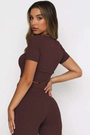 Brown ribbed crop top and wide leg pants set on model