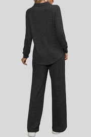 Black ribbed knit lounge set with collar and wide leg pants.