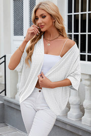 White open-front crochet kimono sleeve top with a subtle geometric pattern.