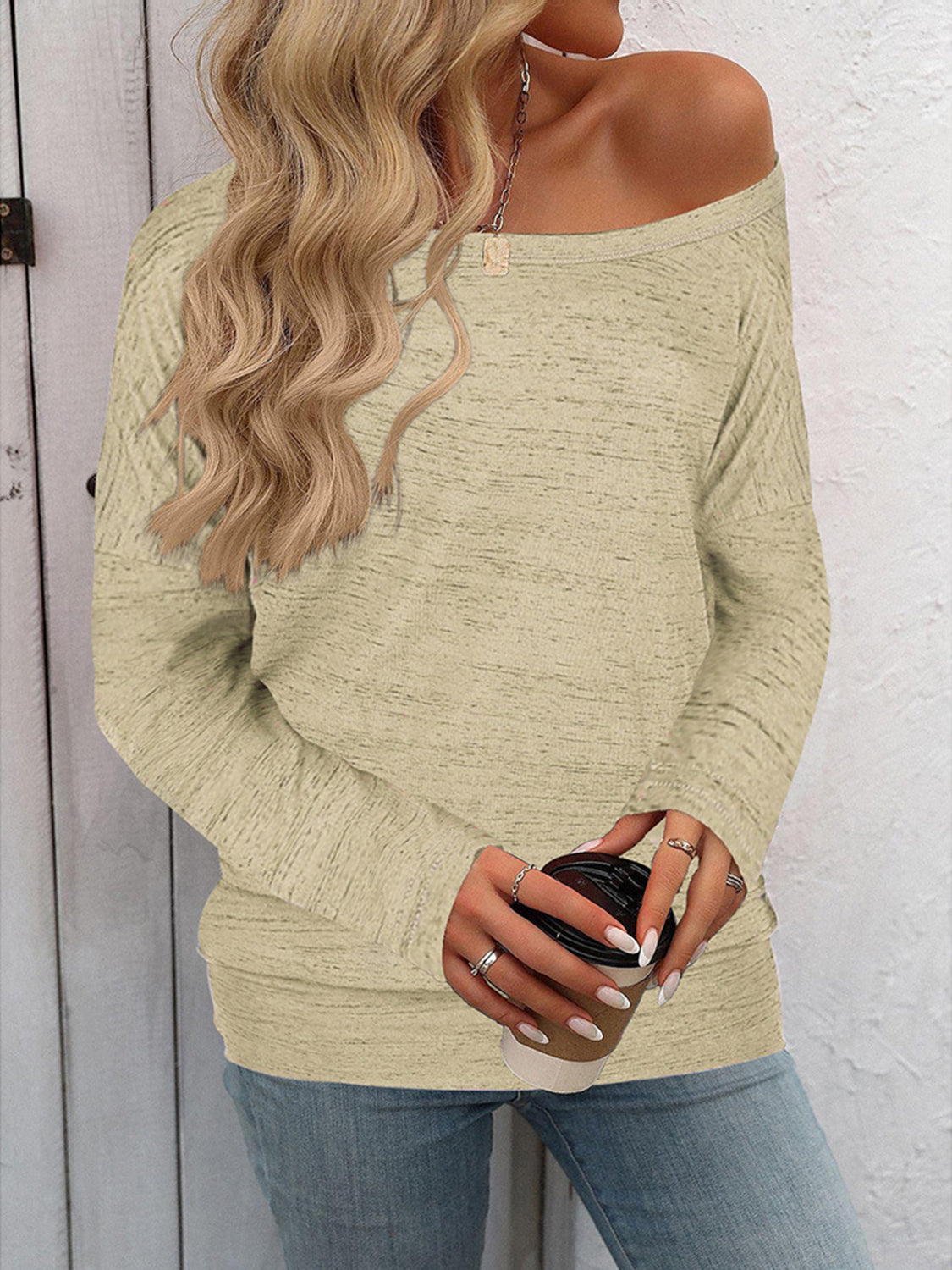 Off-the-shoulder heathered knit top in tan, long sleeve sweater with relaxed fit.