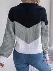 Chevron block knit polo sweater in acrylic with a colorblock pattern and ribbed details.