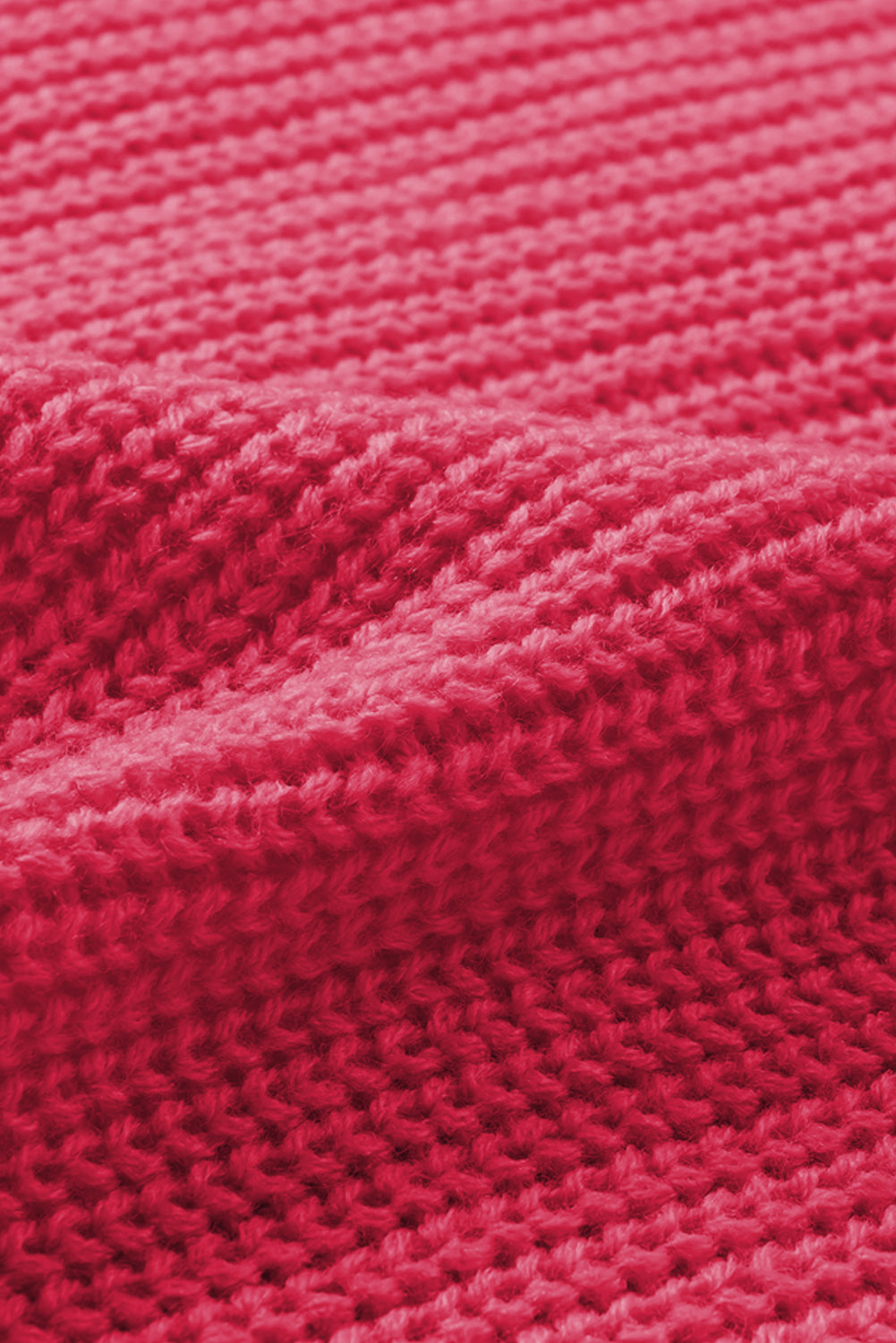 Diamond-cut sleeve knit cardigan in hot pink acrylic with a ribbed texture.