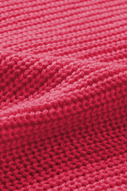 Diamond-cut sleeve knit cardigan in hot pink acrylic with a ribbed texture.