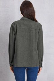 Washed dark gray denim shirt with pointed collar and button cuffs, shown from the back.