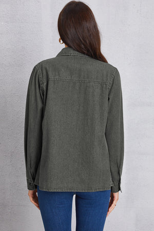 Washed dark gray denim shirt with pointed collar and button cuffs, shown from the back.