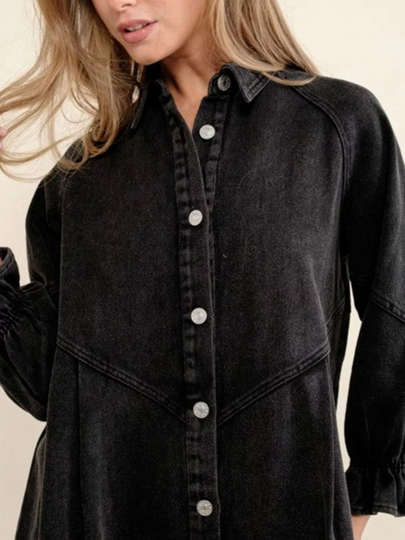 Black denim button-down dress with ruffled cuffs and collar.