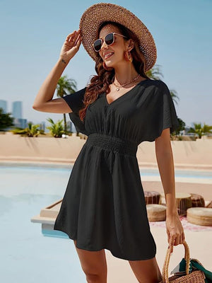 Black shirred waistline flutter sleeve mini dress with V-neck